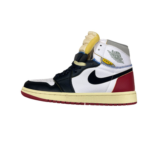 Air Jordan 1 Retro High Black Toe Union LA sneaker, black and white leather with deconstructed detailing, side profile view