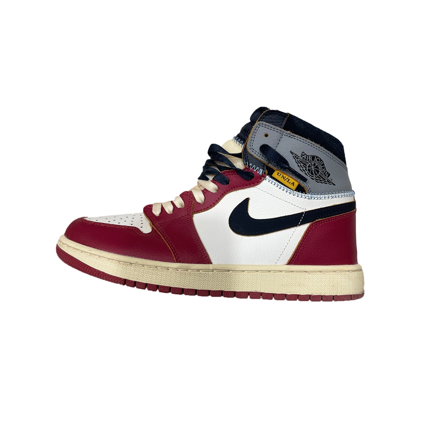 Air Jordan 1 Retro High Chicago Shadow Union LA sneaker, muted deconstructed leather design, side profile view
