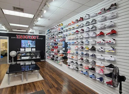 Knockout Sneaker Boutique store interior, wall display of Jordan and Nike sneakers, Downtown Wichita